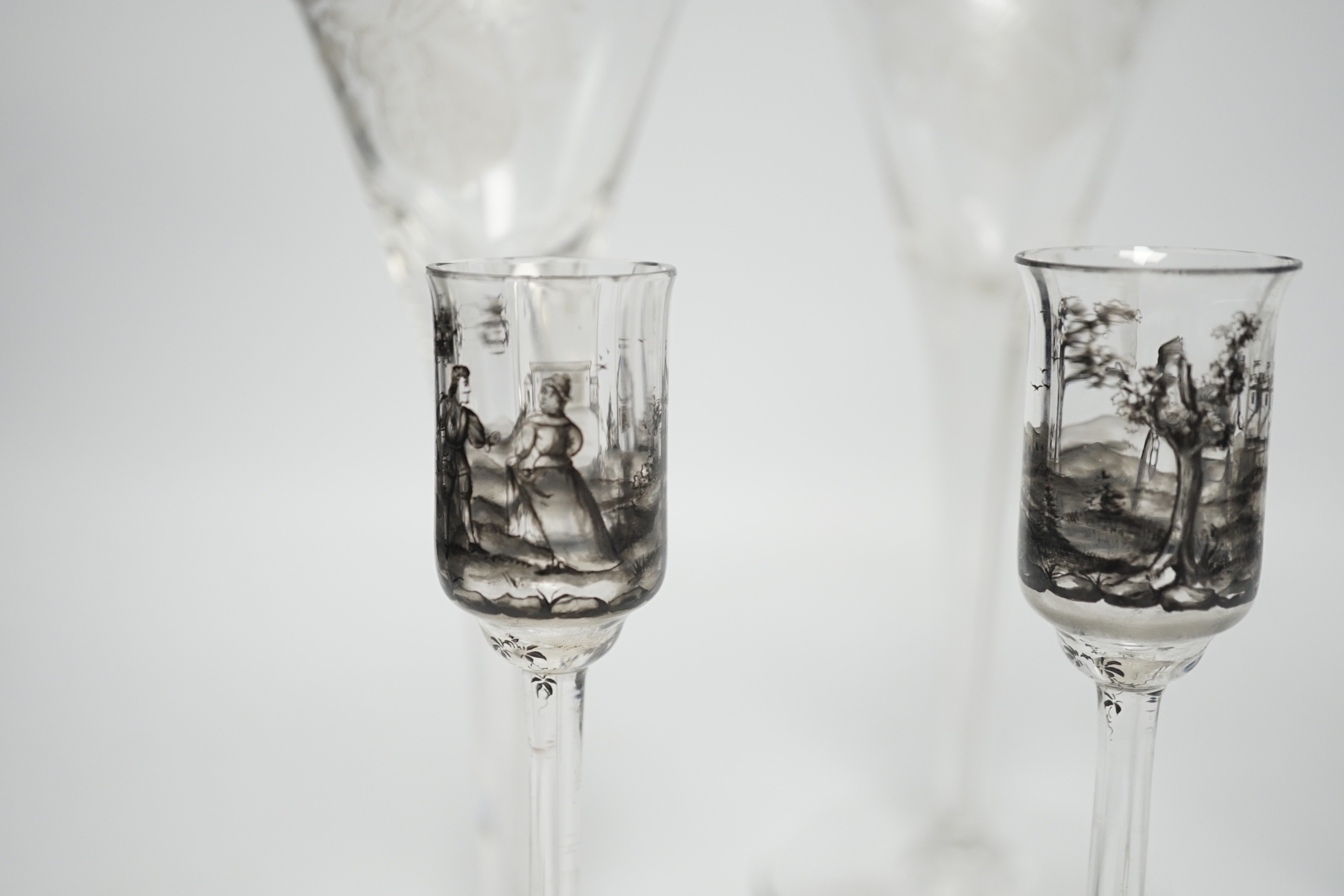 Set of three armorial crest etched flutes and three enamelled liqueur glasses, largest, 23cm high